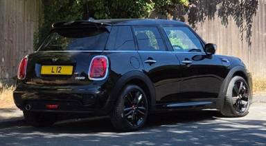 UK Number Plate L 12 on a 2019 Black Mini Cooper