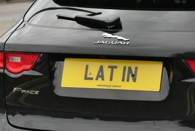 UK Number Plate LAT 1N on a 2017 Black Jaguar F-Pace