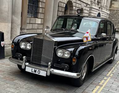 UK Number Plate LM 0 on a 1984 Black Rolls Royce Phantom 6