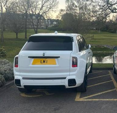 UK Number Plate LM 1 on a 2024 White Rolls Royce Cullinan Black Badge Auto