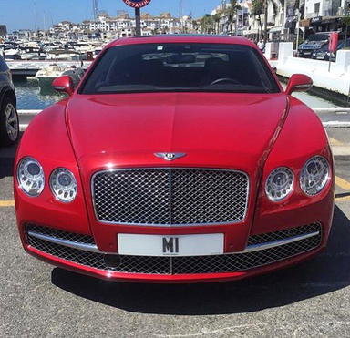 UK Number Plate M 1 on a 2014 RED Bentley Flying Spur
