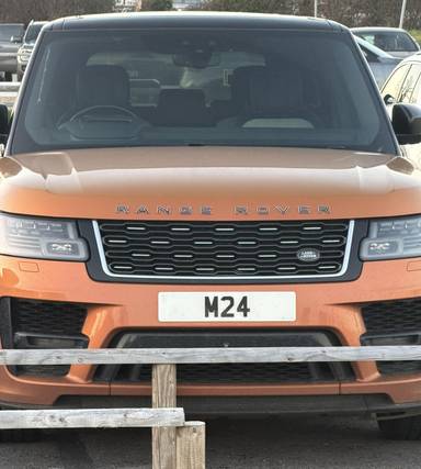 UK Number Plate M 24 on a 2018 Orange Land Rover Autobiography