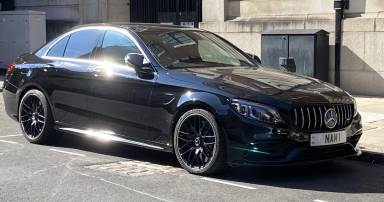 UK Number Plate NAM 1 on a 2021 Black Mercedes-Benz C