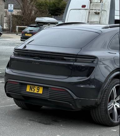 UK Number Plate NS 9 on a 2024 Black Porsche Macan Turbo Electric