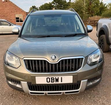 UK Number Plate OBW 1 on a 2017 Green Skoda Yeti