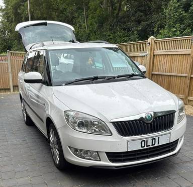 UK Number Plate OLD 1 on a White Skoda Fabia