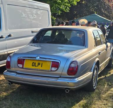 UK Number Plate OLP 1 on a 1999 Silver Rolls Royce Silver Seraph
