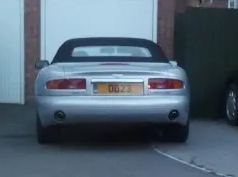 UK Number Plate OO 23 on a 2001 Silver Aston Martin DB7