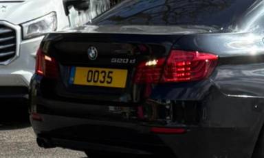 UK Number Plate OO 35 on a 2015 Black BMW 520