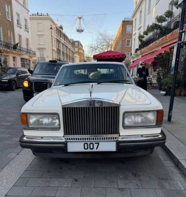 UK Number Plate OO 7 on a 1987 White Rolls Royce Silver Spirit