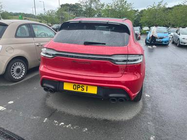 UK Number Plate OPS 1 on a 2023 RED Porsche Macan