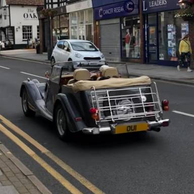 UK Number Plate OU 1 on a 2001 Grey Morgan 4/4