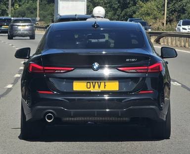 UK Number Plate OVV 1 on a 2022 Black BMW 218i M Sport Auto