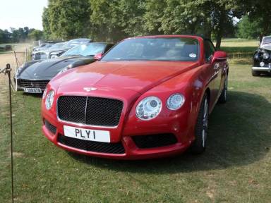 UK Number Plate PLY 1 on a 2013 RED Bentley Continental