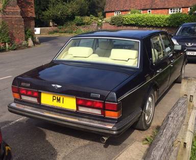 UK Number Plate PM 1 on a 1990 Blue Bentley Eight