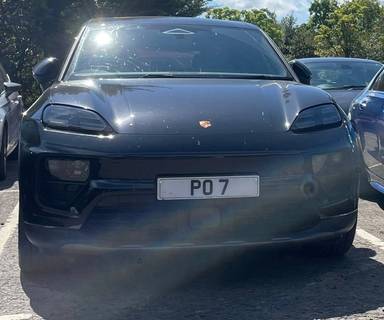 UK Number Plate PO 7 on a 2024 Black Porsche Macan 4 Electric