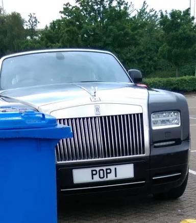 UK Number Plate POP 1 on a 2013 Brown Rolls Royce Phantom
