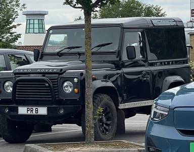 UK Number Plate PR 8 on a 2008 Black Land Rover Defender