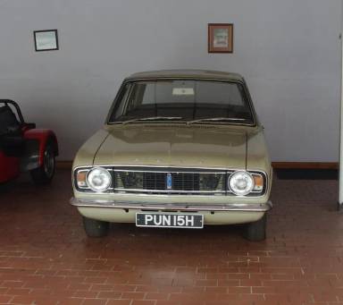 UK Number Plate PUN 15H on a 1969 Beige Ford Lotus Cortina