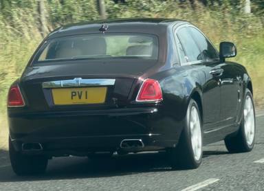 UK Number Plate PV 1 on a 2011 Black Rolls Royce Ghost