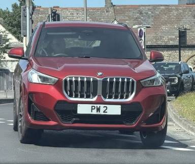UK Number Plate PW 2 on a 2026 RED BMW X1 Sdrive 20i M Sport Mhev A