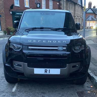 UK Number Plate R 1 on a 2025 Black Land Rover Defender Xdynamic Hse D Mhev A