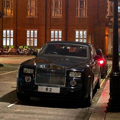 UK Number Plate R 2 on a 2005 Black Rolls Royce Phantom