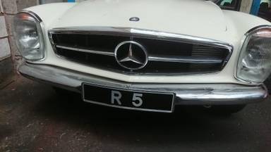 UK Number Plate R 5 on a 1971 White Mercedes 280