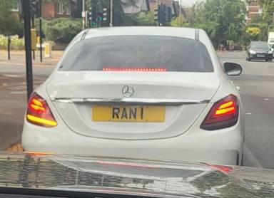 UK Number Plate RAN 1 on a 2019 White Mercedes-Benz C