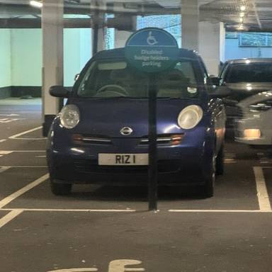 UK Number Plate RIZ 1 on a 2004 Blue Nissan Micra