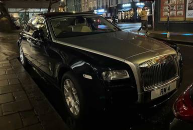 UK Number Plate RM 4 on a 2012 Blue Rolls Royce Ghost