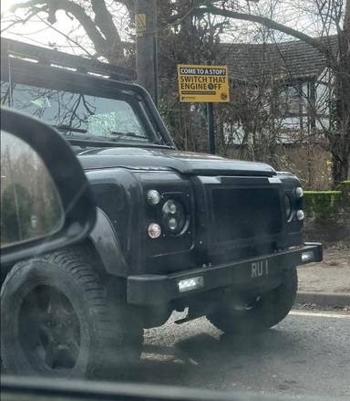UK Number Plate RU 1 on a 2015 Brown Land Rover Defender