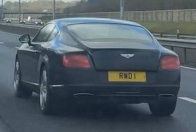 UK Number Plate RWD 1 on a 2011 Black Bentley Continental
