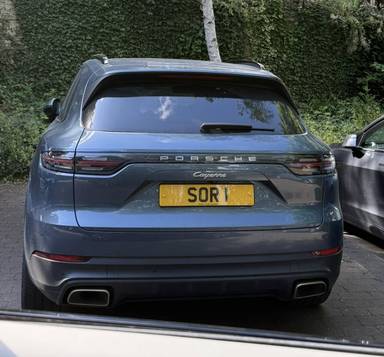 UK Number Plate SOR 1 on a 2019 Blue Porsche Cayenne