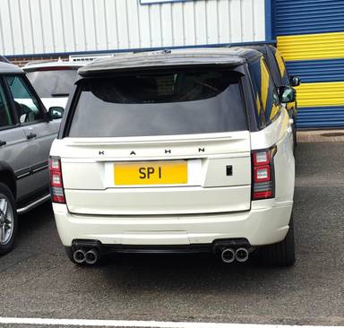 UK Number Plate SP 1 on a 2013 White Land Rover Range Rover