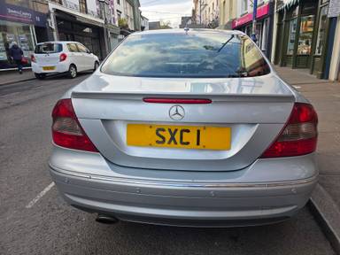 UK Number Plate SXC 1 on a 2007 Silver Mercedes CLK