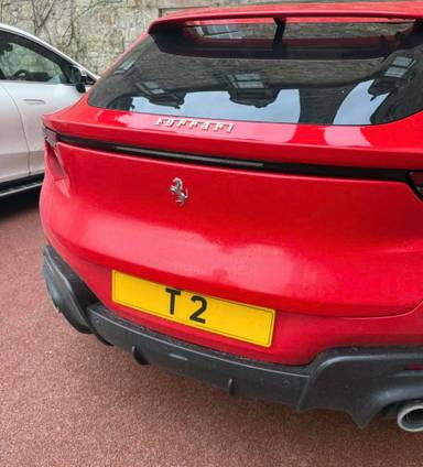 UK Number Plate T 2 on a 2024 RED Ferrari Purosangue S-A
