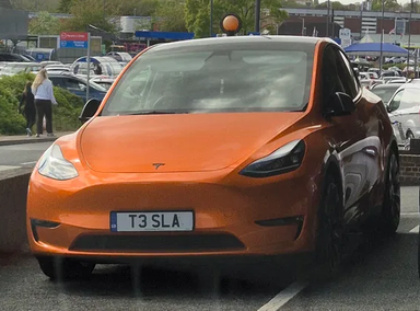 UK Number Plate T3 SLA on a 2023 White Tesla Model Y Performance Awd