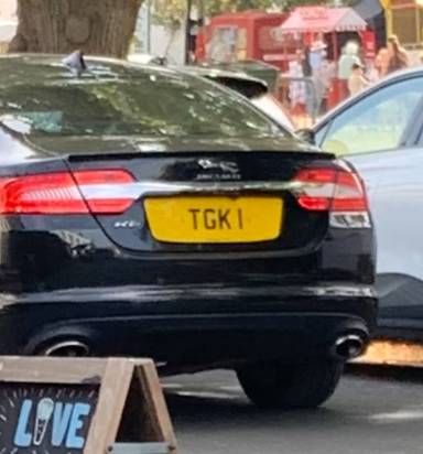 UK Number Plate TGK 1 on a 2015 Black Jaguar XF
