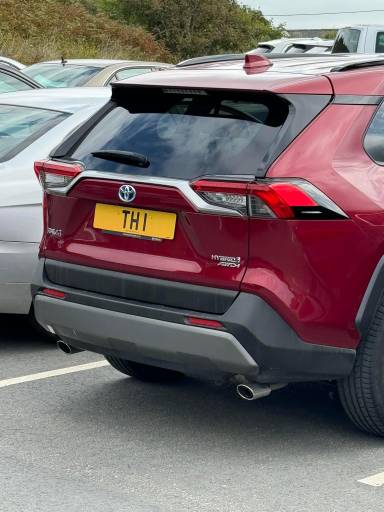 UK Number Plate TH 1 on a 2021 RED Toyota Rav4