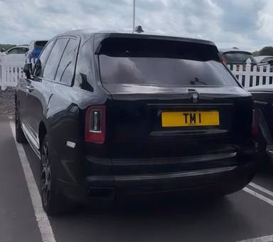 UK Number Plate TM 1 on a 2022 Black Rolls Royce Cullinan Black Badge Auto