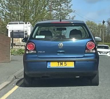 UK Number Plate TM 5 on a 2006 Blue Volkswagen Polo