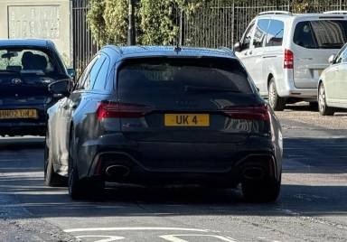 UK Number Plate UK 4 on a 2023 Black Audi Rs 6 V-Sprung Tfsi Mhev Quat A