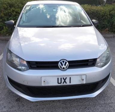 UK Number Plate UX 1 on a 2014 Silver Volkswagen Polo