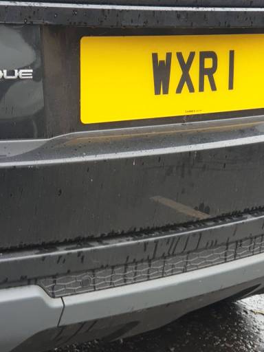 UK Number Plate WXR 1 on a 2017 Black Land Rover Range Rover Evoque