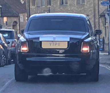 UK Number Plate YTP 1 on a 2007 Black Rolls Royce Phantom